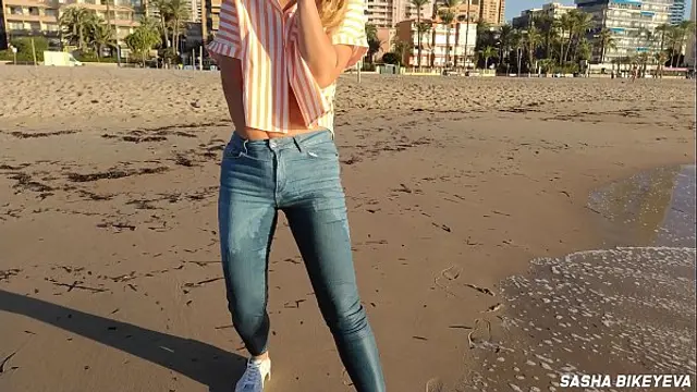 Wet shoot on a public beach with Crazy Model&period; Risky outdoor masturbation&period; Foot fetish&period; Pee in jeans&period;