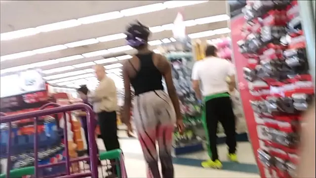 sexy black woman on white and pink tight pants with big ass and tight pussy - sexy woman mamacita negra with pink and white tight pants marking the slit of the pussy and big ass