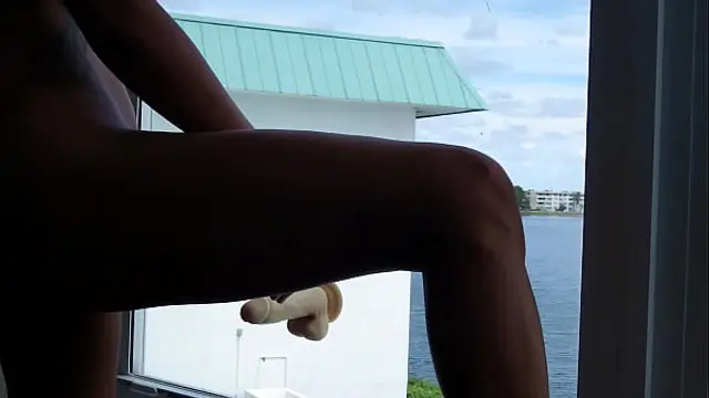 Public view&period; Wife rides a dildo in a window&period; Voyeurstyle&period;