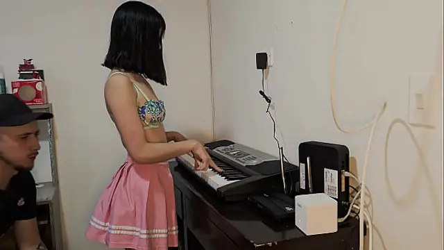 Sexy and hot Laura in skirt wants to learn to play the piano&period;