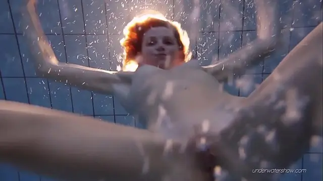 Nastya hot blonde naked in the pool
