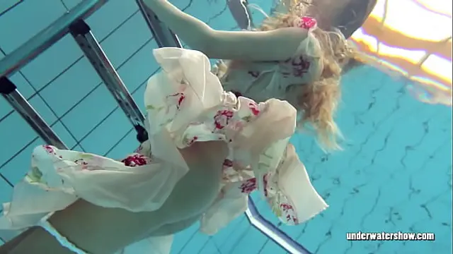 Hot babe Lucy swims nude