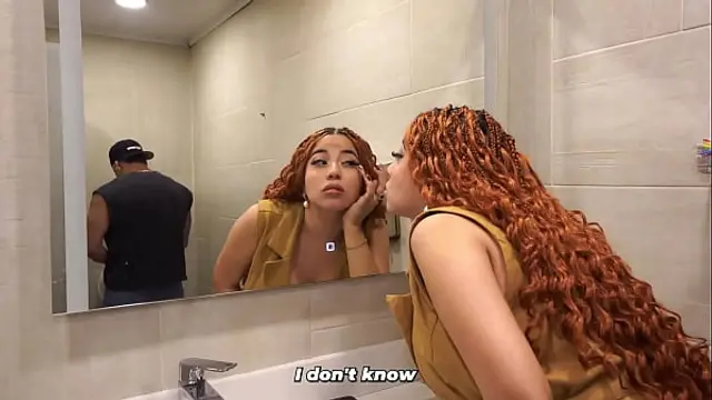 Distracted busty redhead ends up in the men's bathroom and can't resist seeing a big dick
