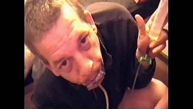 bisexual mark wright swollows a 180 ml of his own piss threw a homemade piss tube