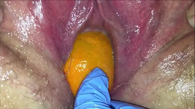 Tight pussy milf gets her pussy destroyed with a orange and big apple popping it out of her tight hole making her squirt